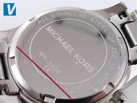 how to open Michael Kors Watch